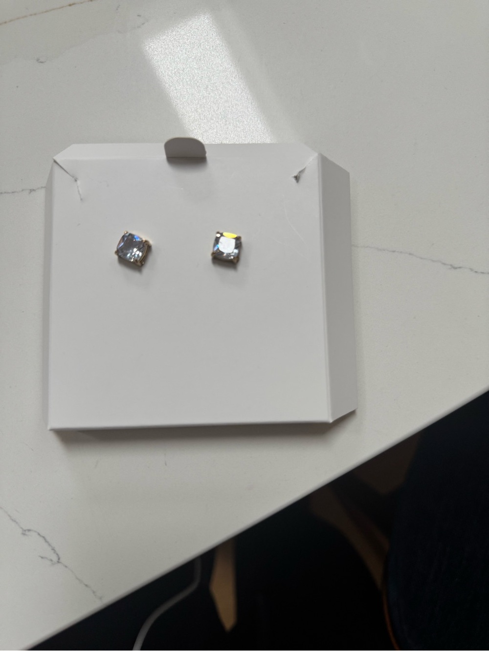 Dimond earrings with gold backings